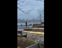 Woman film white colored statue at park