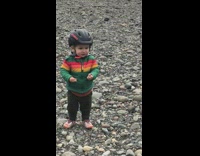 Man shirtless dumbbells beach photo shoot