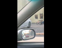 Grown men parking lot tricycle party