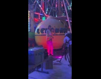 Woman white crop top dances on Lemonade statue Part 1