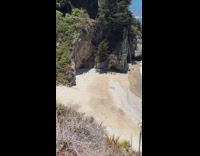 Drone shot of beach zooms in send nudes