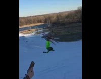 guy bright green pants back flip ski
