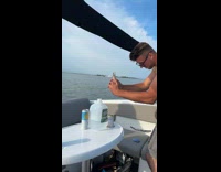 Collab IITW - Woman poses for a photo on speedboat 