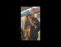 Man rapping inside the subway train