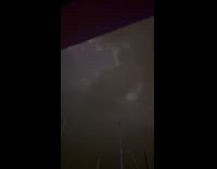 Continuous lightning flicker in the dark sky