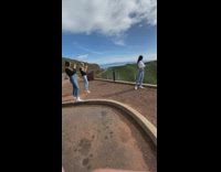 Woman white crop top spread arms pictorial