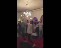 White T-Shirt Grabs Onto Chandelier and Breaks It