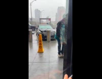 Woman shows car crashed into sidewalk bollard 