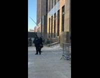 Woman showing support for Luigi Mangione 