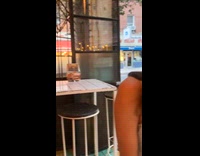 Guy bounce on street using pogo stick