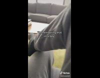 Grey sweats person sitting ankle foot on leg