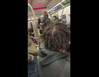 Collab Subway Creatures - Guy on subway plays two drums 