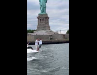 Two guys reenact titanic pose at yacht