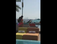 two girls bright pink bikinis