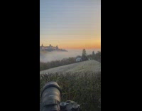 Camera tripod castle sunrise orange sky house