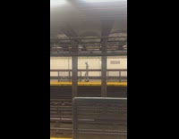 Man silver metal costume walk subway station