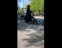 Collab winy - Woman on bike surrounded by birds park