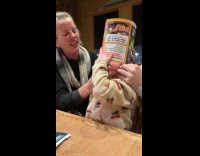 Toddler got head stuck in food menu