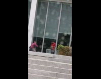 Red flannel guy walks towards photographer rain 