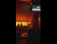 Woman bend over at the bar restaurant hotel