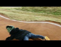 Little boy runs on bumpy road and falls down