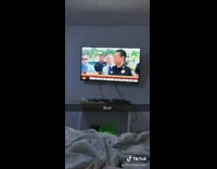 Guy next to girl on news bedroom 