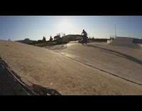 Biker jumps off ramp, turns handle bar, and falls on landing