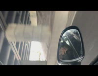 Guy drives by boat left on grass