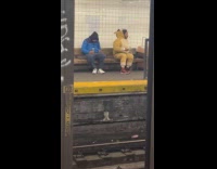 Man animal onesie costume sit on subway bench