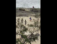 Girl blue backless swimsuit dance video beach