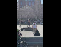 Guy in empty fountain twirls stick pt. 3