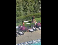 Collab IITW - Woman violet bikini holds drink flower bush