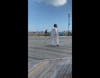 Guy welding mask hazmat suit long pole