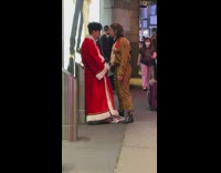 Couple argues in holiday costumes 