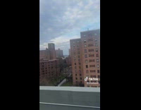 Girl complains about colorful gentrification buildings 