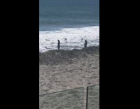 Woman bikini photo shoot beach waves fail