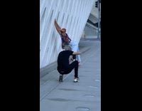 Man bend back lean white wall pictorial