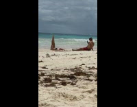 Woman black bikini lay down beach pictorial Part 3