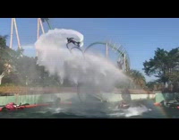 Red shorts guy flyboard backflip fail water