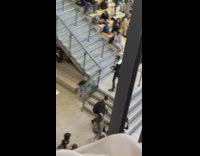 Guy ski down school stairs for Halloween