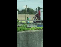 Guy green shirt crazy dance bridge truck