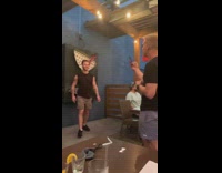 Guy poses off neon light cocktail drink 