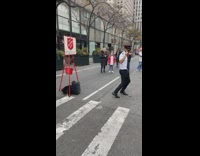 Salvation army worker doing the most for donations