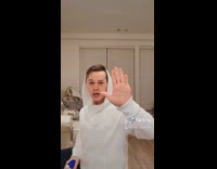 Guy shoots gun lysol disinfectant spray