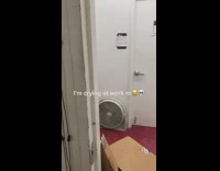 Coworkers look at guy singing at work