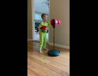 Little kid green pajamas boxing fail