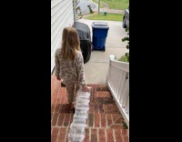 Kid Drags Long Strand of Air Pillow