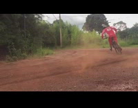 Guy on bike makes sharp turn 