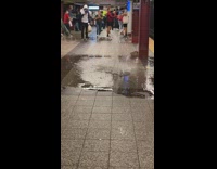 water fountain burst from ground subway platform