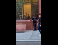 Collab WINY - Man make small fire beside window street